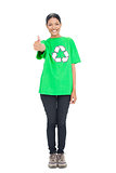 Black haired model wearing recycling tshirt giving thumb up