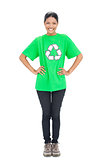 Cheerful black haired model wearing recycling tshirt