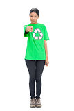 Pretty black haired model wearing recycling tshirt pointing at camera