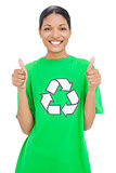 Smiling model wearing recycling tshirt giving thumbs up