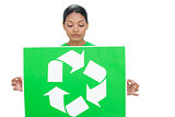 Content model holding recycling sign