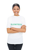 Cheerful model wearing volunteer tshirt posing