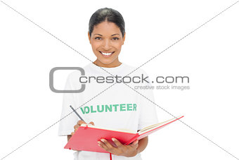 Happy model wearing volunteer tshirt writing