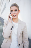 Smiling attractive businesswoman on the phone