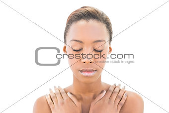 Natural beauty with hands on shoulders