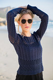 Gorgeous casual blonde with stylish sunglasses posing