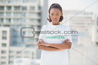 Serious woman with crossed arms
