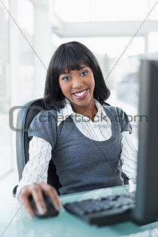 Relaxed businesswoman working on computer