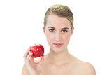 Attractive blonde holding red apple