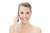 Smiling attractive blonde on the phone