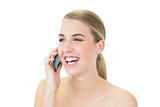 Cheerful attractive blonde on the phone