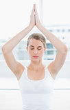 Peaceful fit woman doing yoga session