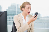 Furious attractive businesswoman on the phone