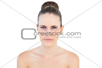 Woman looking angry at camera