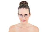 Serious woman wearing glasses