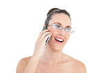 Woman with glasses talking on the phone