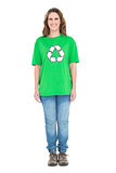 Environmental activist wearing green tshirt with recycling symbol on it
