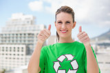 Smiling environmental activist giving thumbs up