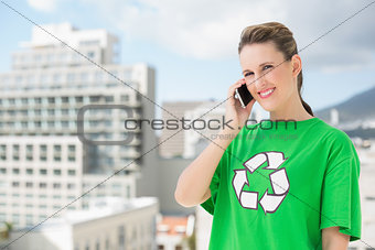 Smiling environmental activist talking on the phone