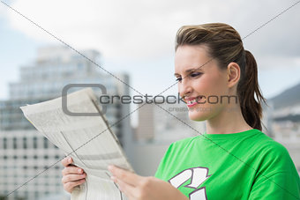 Environmental activist reading newspaper