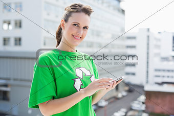 Smiling activist using her phone