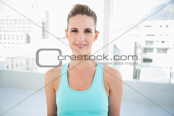 Smiling woman in sportswear