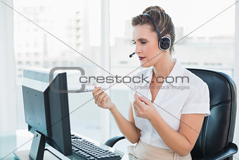 Focused call centre agent having a call