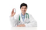 doctor showing a bottle of pills