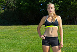 Athletic woman in a sports bra and shorts