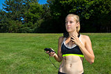 Fit woman listening to music during a workout