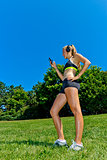 Fit woman listening to music during a workout