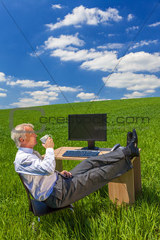 Businessman Relaxing Drinking Coffee Tea Green Field Desk
