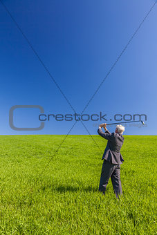 Business Man Businessman Playing Golf in Green Field