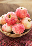 Fresh red apples in basket