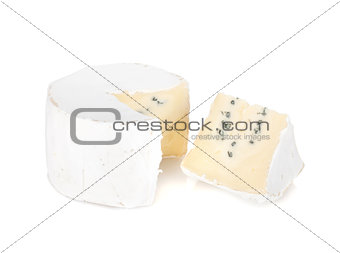 A piece of soft brie cheese