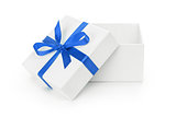 open white textured gift box with blue ribbon bow