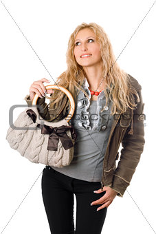 Portrait of pretty young blonde with a handbag