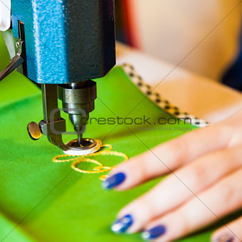 Lady hand at sewing