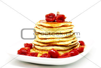 Pancakes with maple syrup and cherries