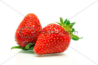 Red ripe strawberries over white