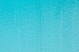 blue structural painted wallpaper on the wall