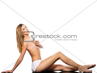 Sensuous young female with hair brush