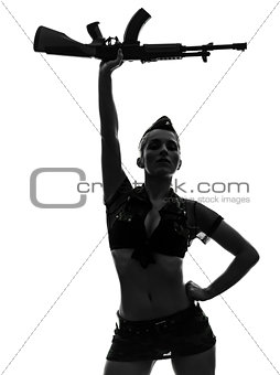 sexy woman in army uniform saluting kalachnikov silhouette