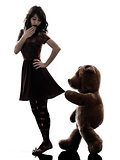 strange young woman and vicious teddy bear  silhouette