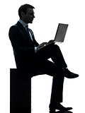 business man computing laptop computer silhouette