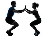 man woman exercising squatts workout fitness