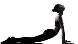 woman exercising yoga sun salutation