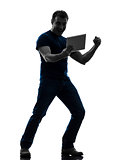 man holding watching  digital tablet  silhouette