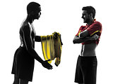 two men soccer player  exchanging jersey standing silhouette