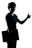 one young teenager girl silhouette holding carrying laptop compu
